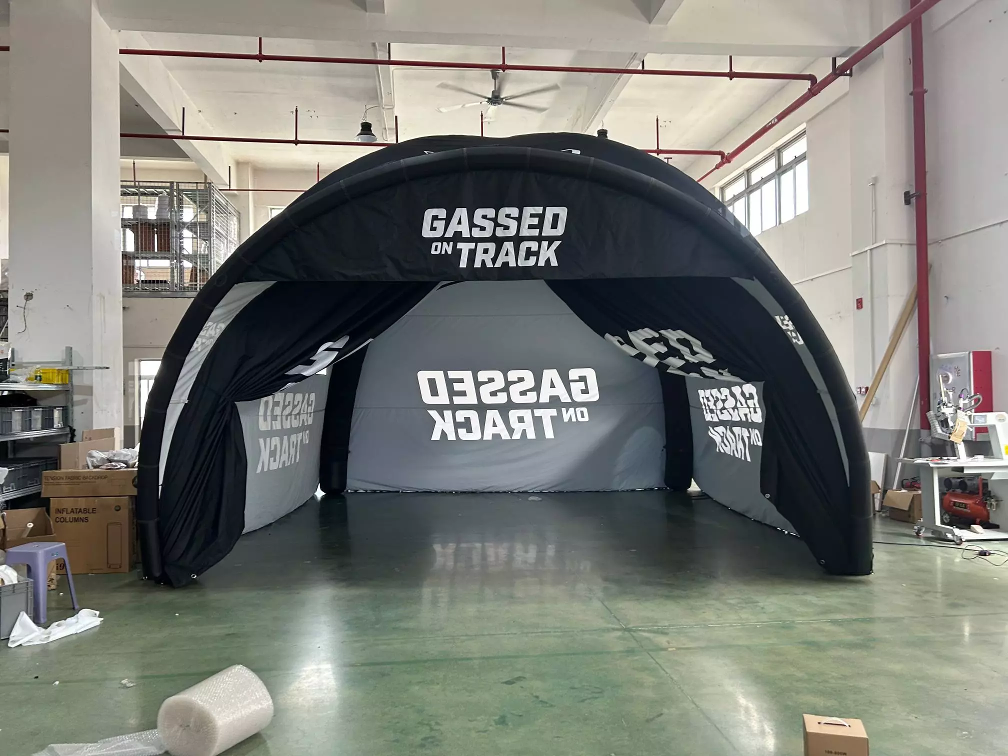 Gassed On Track inflatable tent in factory